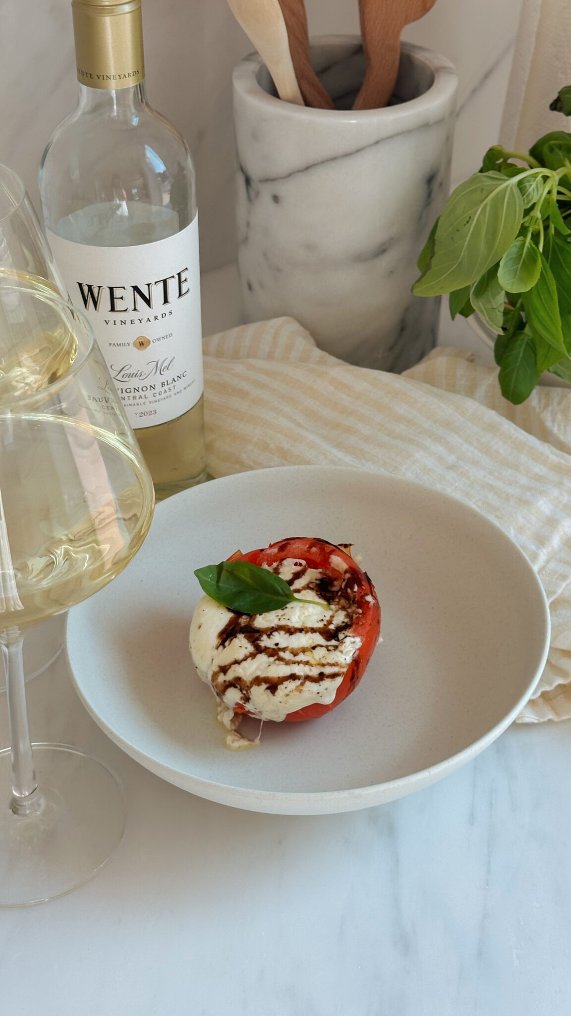 https://wentevineyards.com/wp-content/uploads/2024/09/Wente-Vineyards-Louis-Mel-Burrata-Stuffed-Tomatoe-Vertical-scaled.jpg